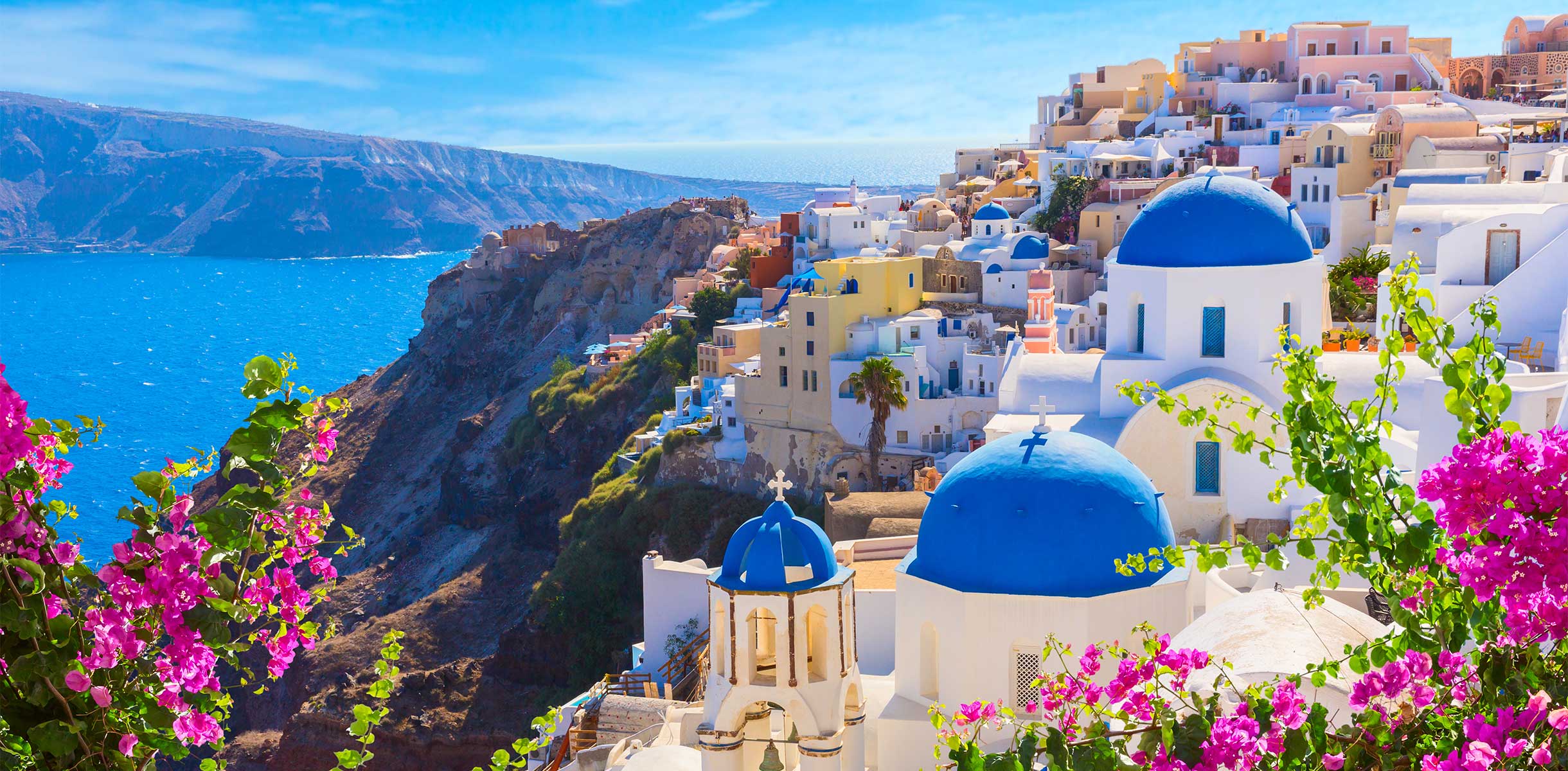 Beautiful views of white washed buildings over Santorini, Greece