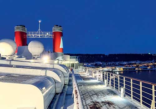 Ships funnels with snow lightly covering the decks