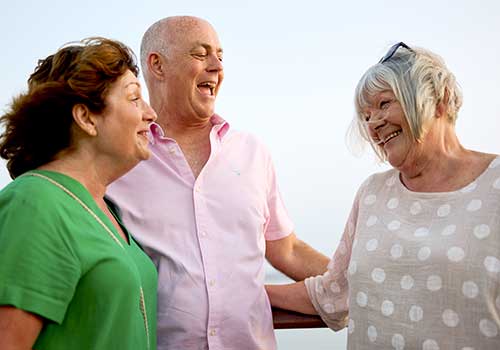 Guests laughing out on deck