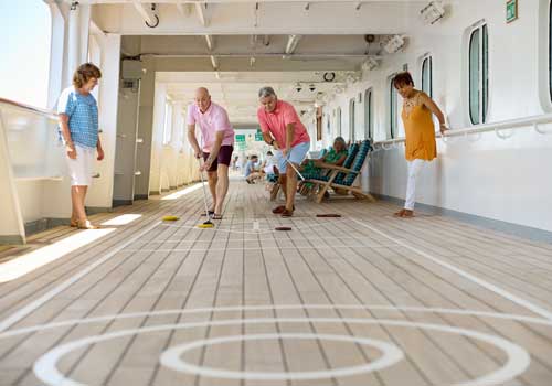 Guests enjoying a game of quoits on deck