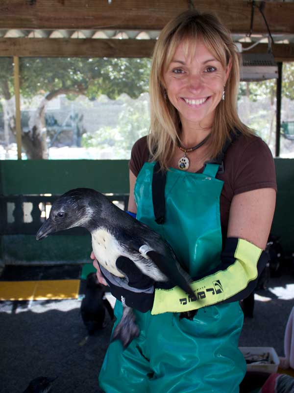 Michaela Stachan holding a penguin
