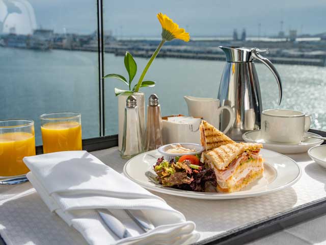 Room Service stacked sandwich and refreshments