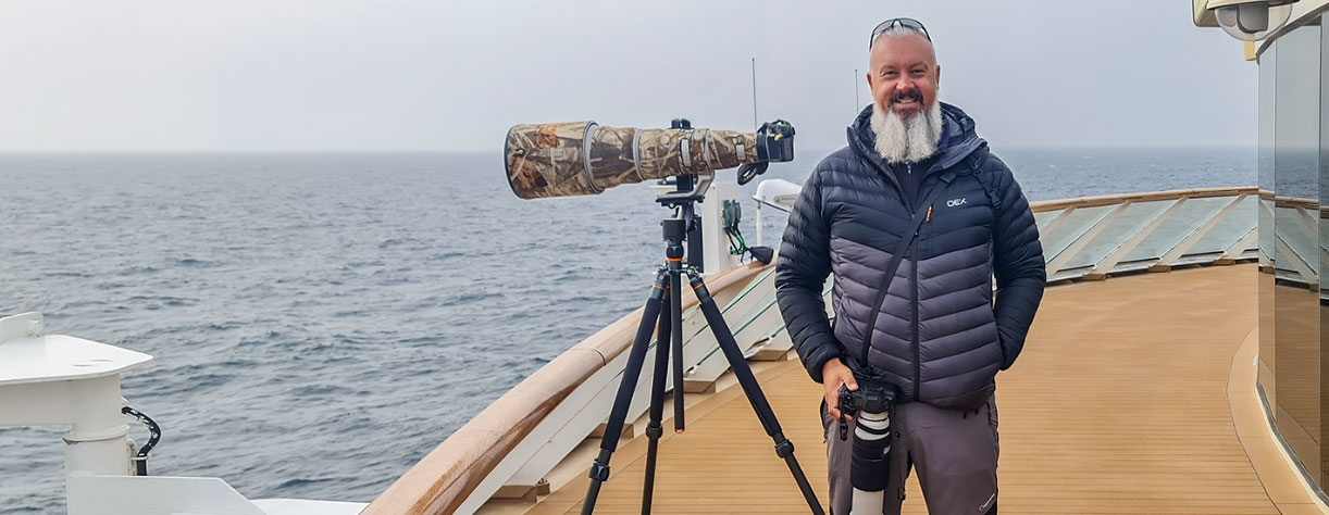 Richard Lovelock and camera on deck
