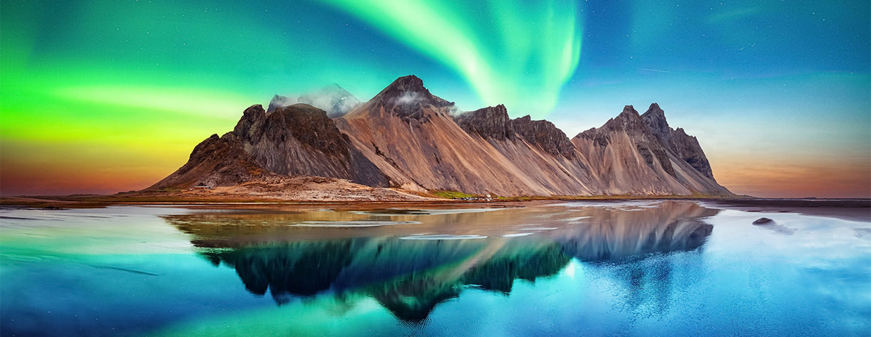 Northern Lights over the Stokksnes Mountains in Iceland