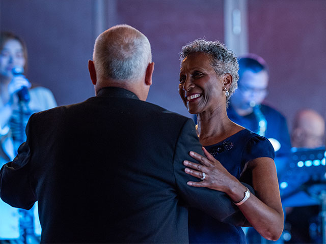 Guest learning to dance with dance host, Bolette
