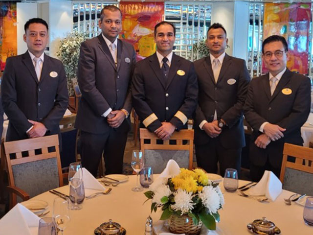 RONNY ALMEIDA, ASSISTANT MAÎTRE D' with crew