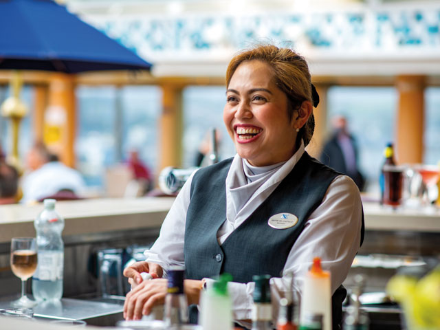 Kiefer serving drinks at Bolette's Lido Bar