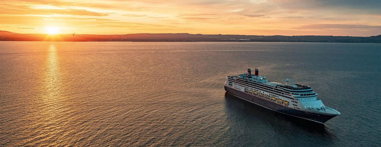 Fred. Olsen’s Borealis cruise ship sailing at sunset