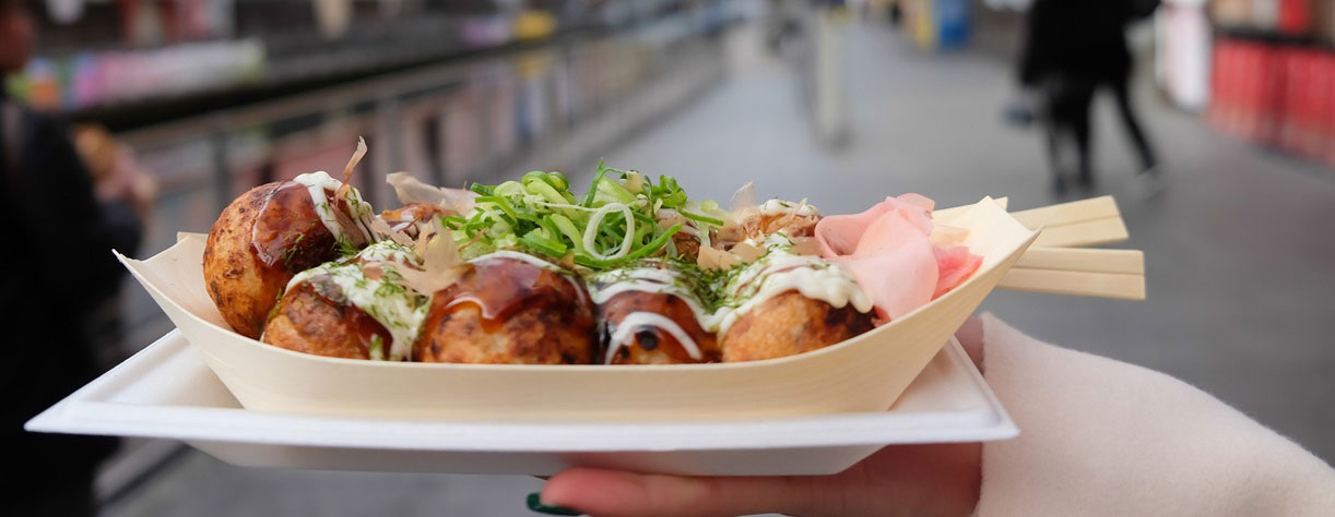 A close-up image of Takoyaki ball dumplings