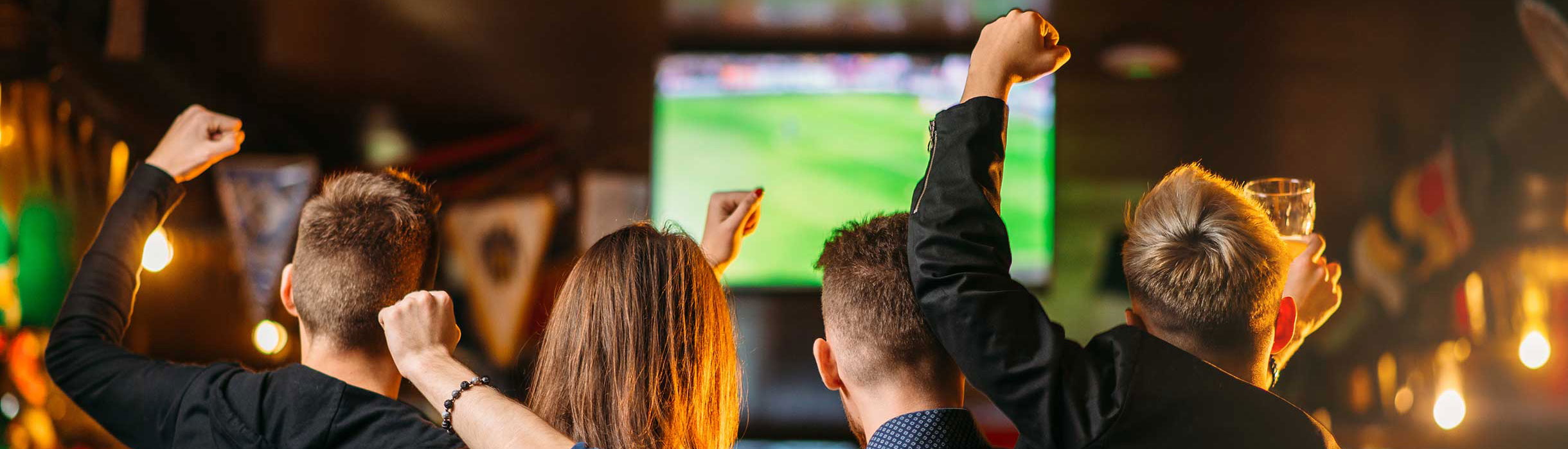 Guests enjoying sporting events on board