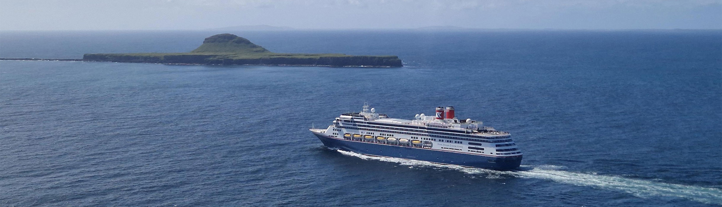 Bolette cruising past the Dutchman's cap, Scotland