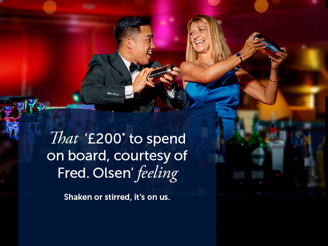 Bar staff and guest shaking cocktails in the Martini Experience on board