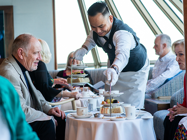 Guests being served Afternoon tea in the Observatory
