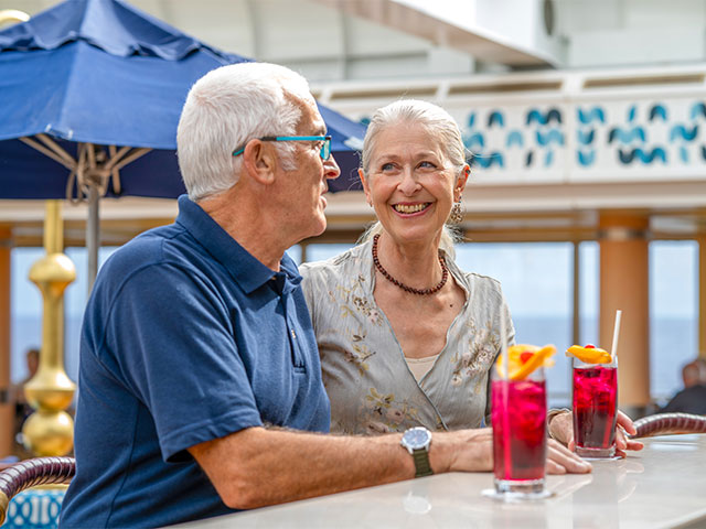 Guests enjoying drinks at the Lido bar, Bolette