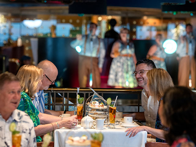 Guests being served Afternoon tea at the Jubilee event, Borealis