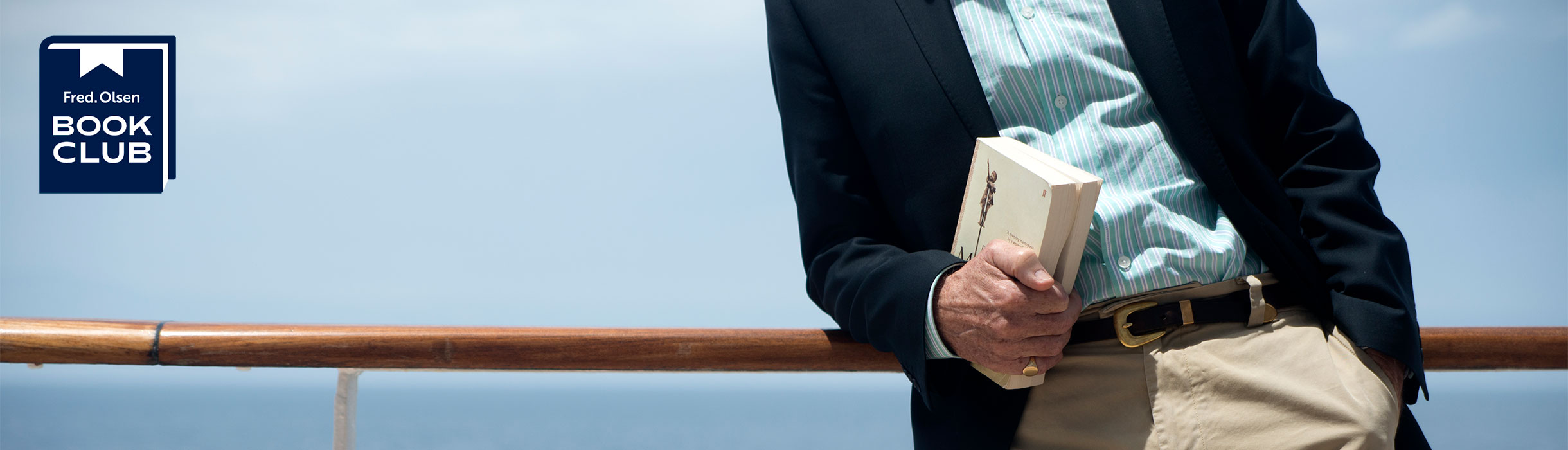 Guest with book on deck