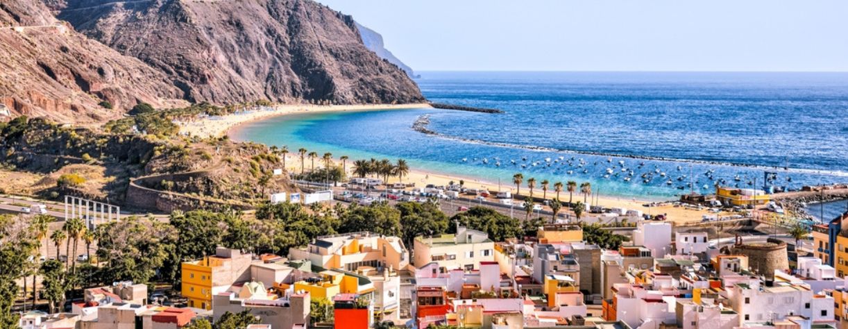 View of the beach and mountains on the beach in Tenerife