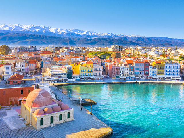 Chania with lighthouse, mosque, venetian shipyards, Crete, Greece.