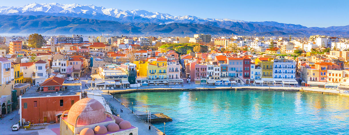 Chania with lighthouse, mosque, venetian shipyards, Crete, Greece.