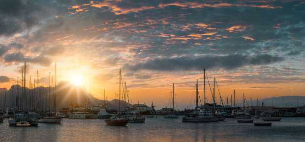 Beautiful sunset over Monte Cara mountain in hardor of Mindelo. Sao Vicente Cape Verde