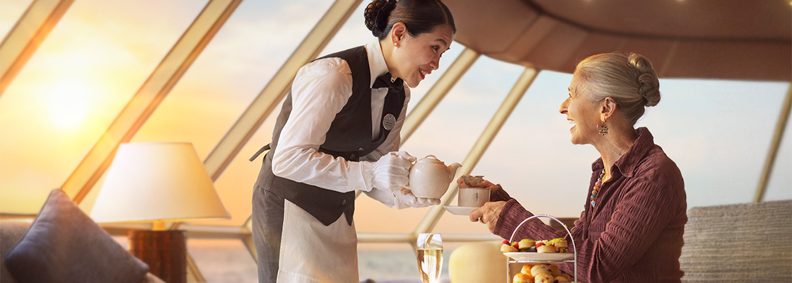 Waitress serving guest in the Observatory, Traditional Premium Afternoon tea