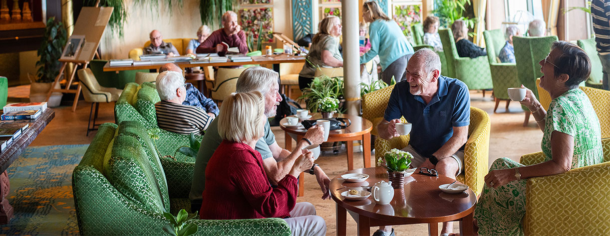 Guests enjoying coffee in the Botanical room