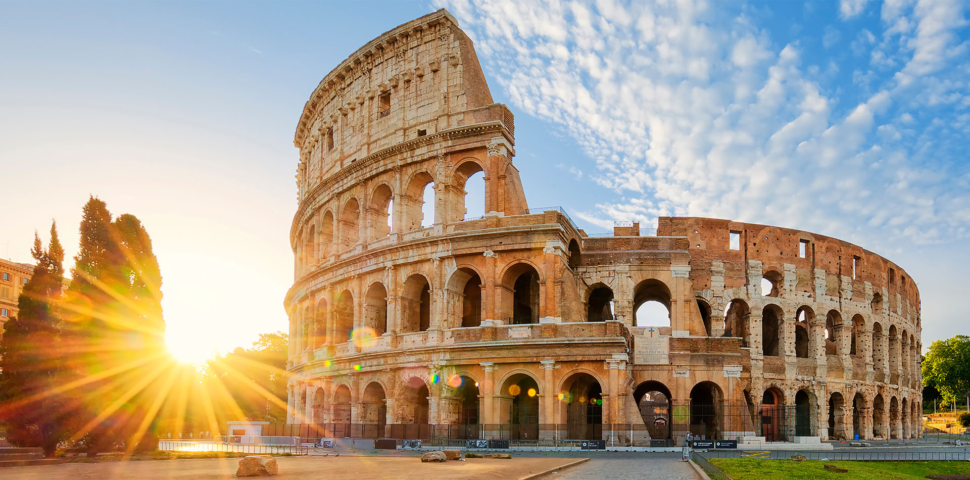 Colosseum in Rome and morning sun, Italy 
