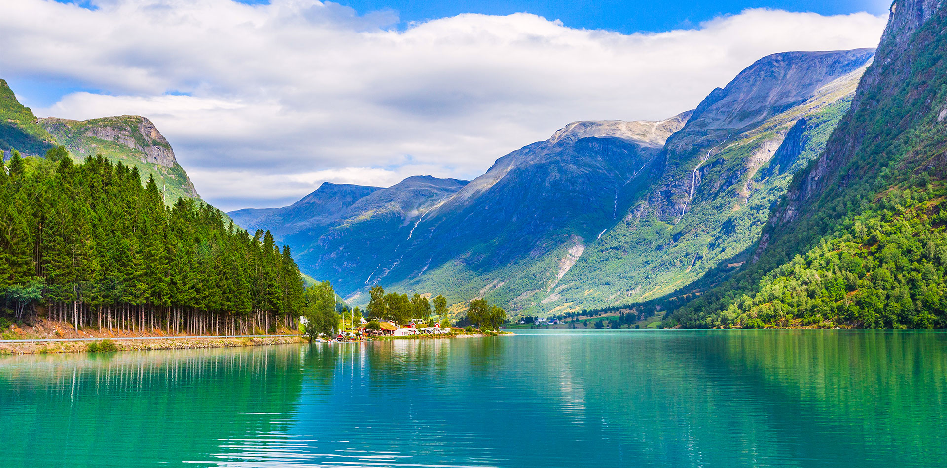 Norwegian landscape with Nordfjord fjord, mountains, forest and glacier in Olden, Norway