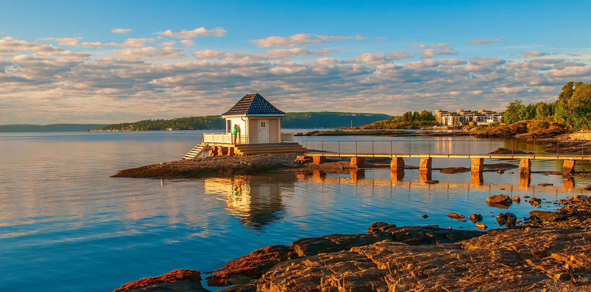 Scenery of Oslofjord with small fisher house on rocky island. Oslo, Norway.