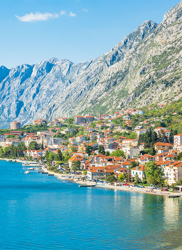 Views of Kotor Bay with high mountains and historic town, Montenegro