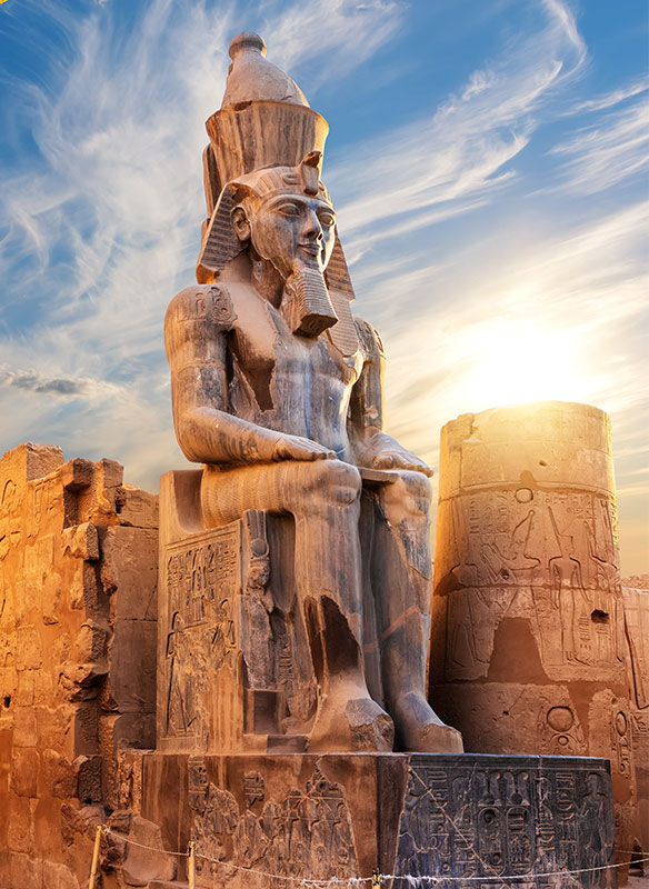 Seated statue of Ramesses II by the Luxor Temple entrance, Egypt