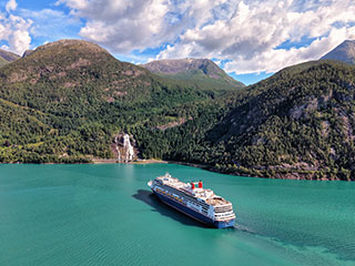 Borealis cruising past Furberg waterfall, Norway
